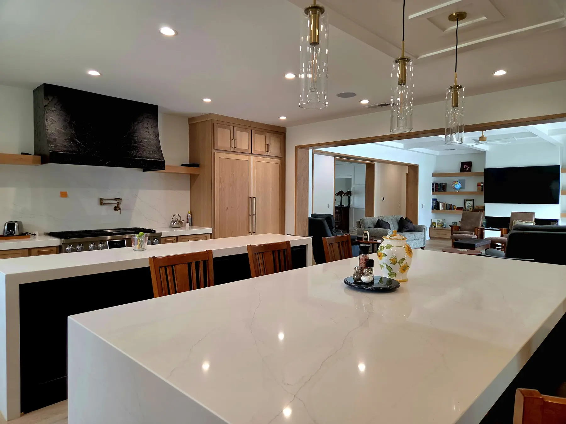 Polished kitchen island and spotless open living space